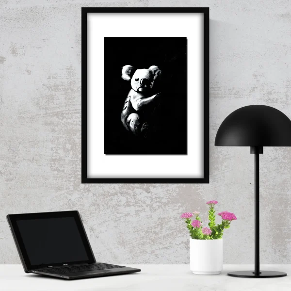 Lifestyle photo of Branch Manager, an Active Void acrylic print of a koala, styled in a room setting