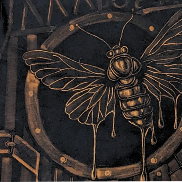 iron-wings-closeup.webp Close-up detail of the bleach-carved artwork on Iron Wings