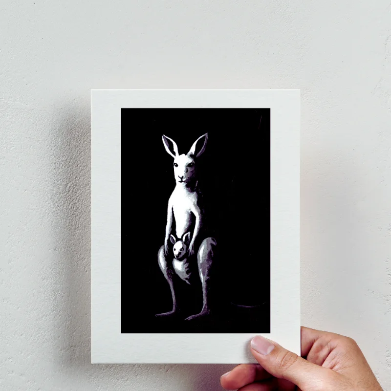 A quiet, stark moment illustrating original vs print artwork
